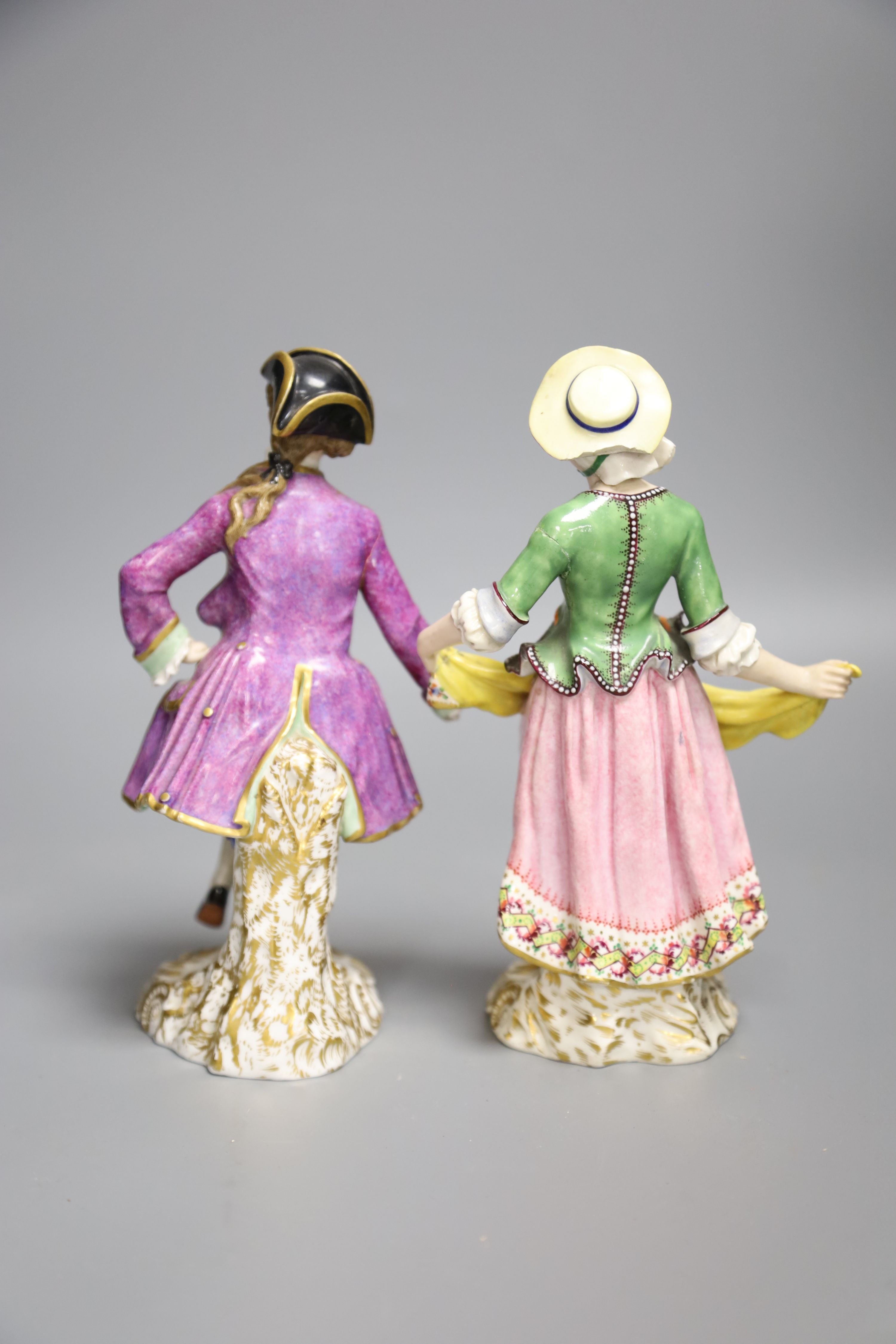 A pair of 19th century Minton figures of a lady and gentleman dancing, height 19.5cm